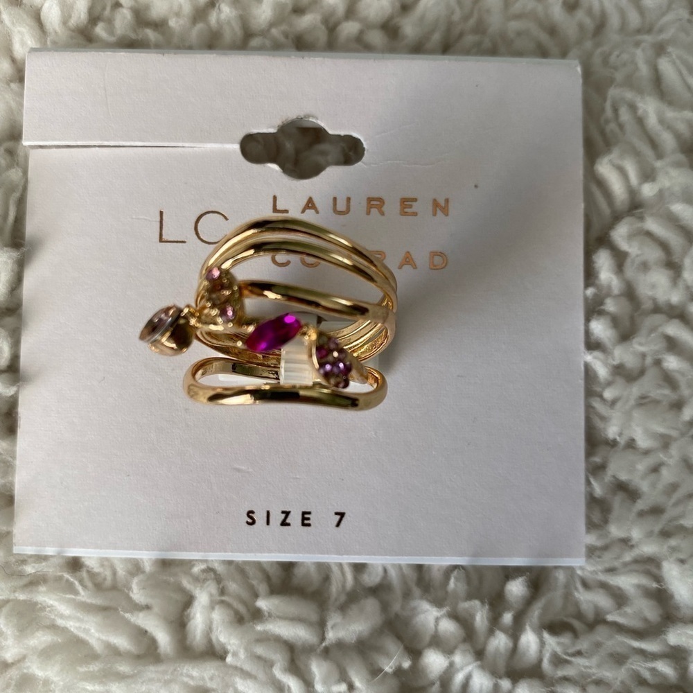 NWT LC Lauren Conrad Rose Gold Tone
Clear Simulated Stones & Wavy Bands Ring Set - Picture 2 of 4